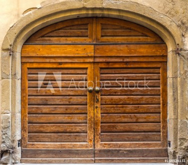 Picture of An old wooden doors element of Italian architecture